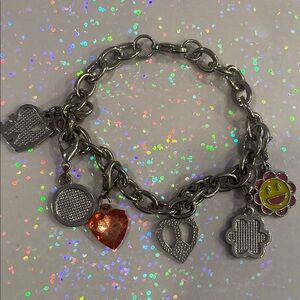 Charming Silver Bracelet with Heart and Flower Charms